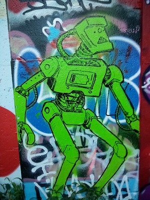 Graffiti image of a green robot